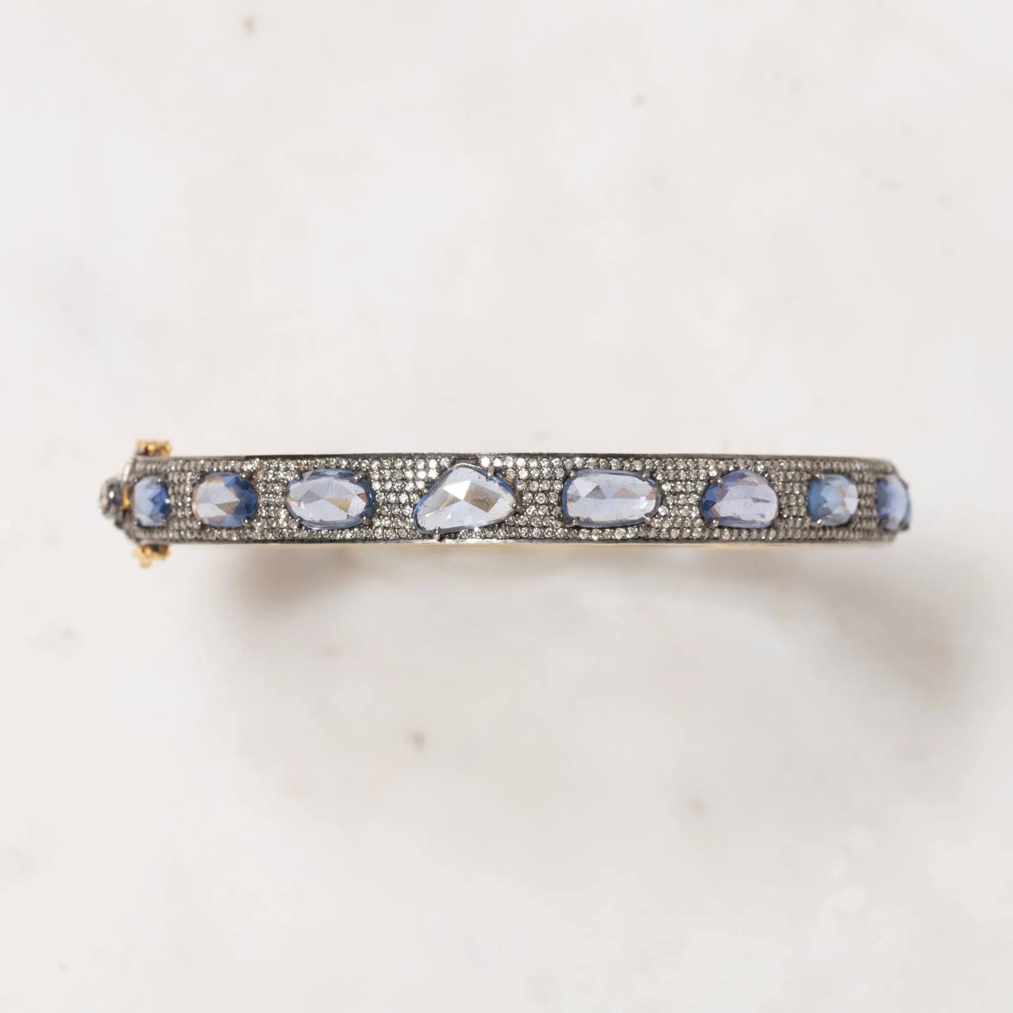 Abstract Topaz and Diamond Bangle