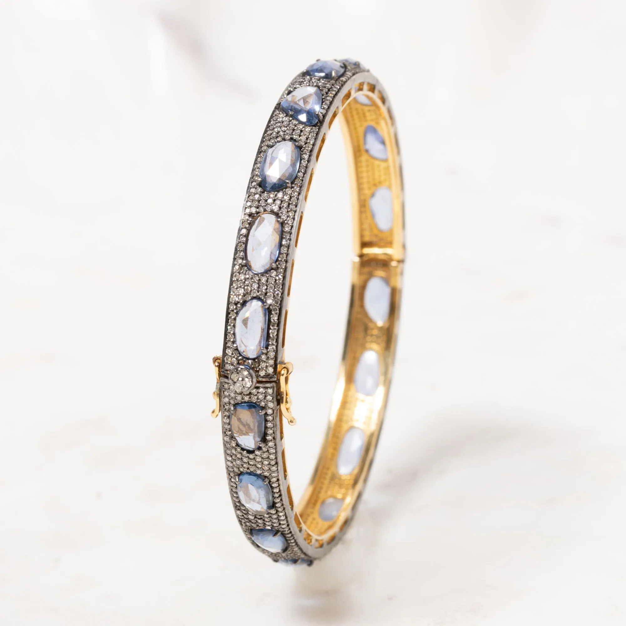 Abstract Topaz and Diamond Bangle