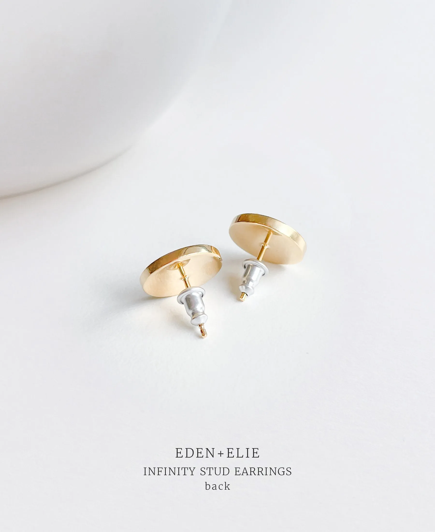 EDEN + ELIE Infinity stud earrings - pollen